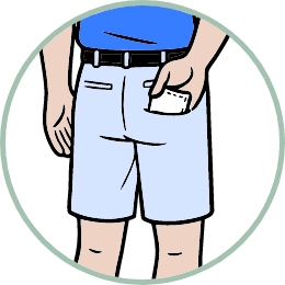 Golfer reaching for scorecard in back pocket